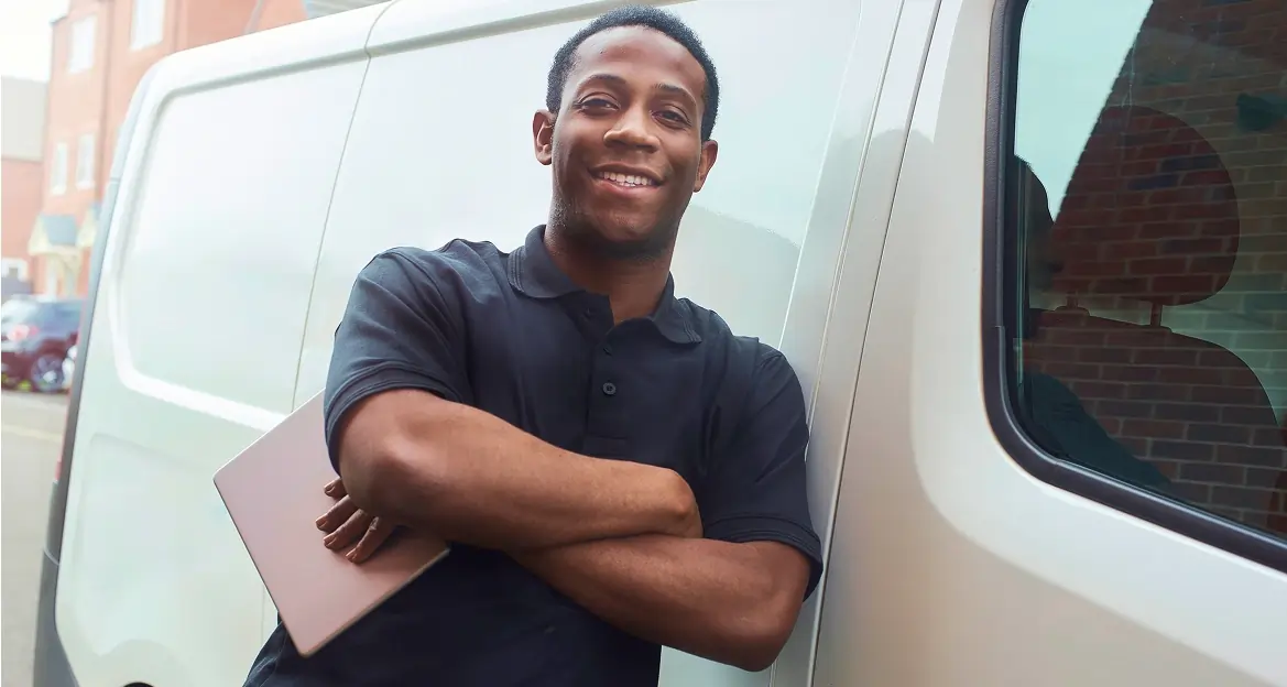 Man leaning against installation van